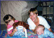 Christina with her "baby" Sarah, and her babysitter Sarah and Sam 9/97